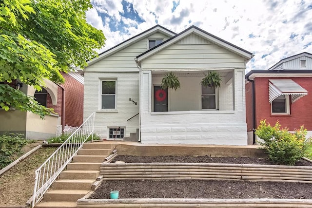 5156 Christy Ave, Saint Louis, MO 63116 - view of front facade with brick siding and stairway