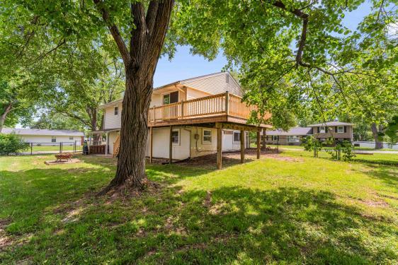 back of property with a deck