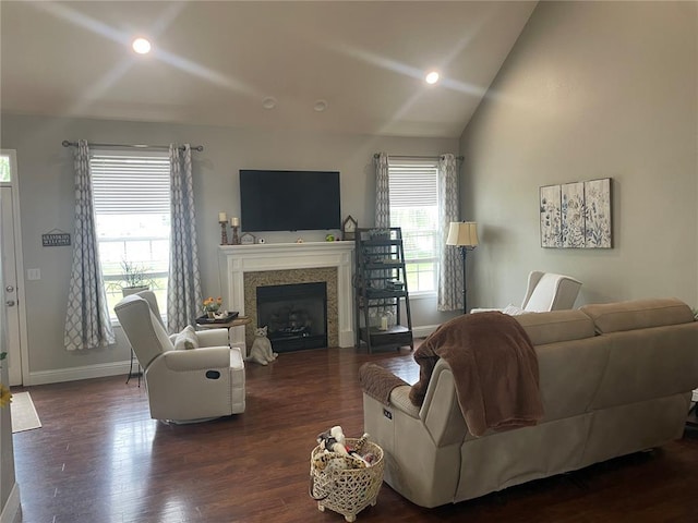 835 Bay Hill Blvd, Union, MO 63084 - living area with vaulted ceiling, baseboards, dark wood finished floors, a fireplace, and recessed lighting