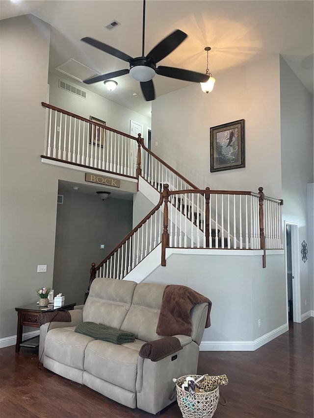 835 Bay Hill Blvd, Union, MO 63084 - living room with wood finished floors, ceiling fan, baseboards, and stairs