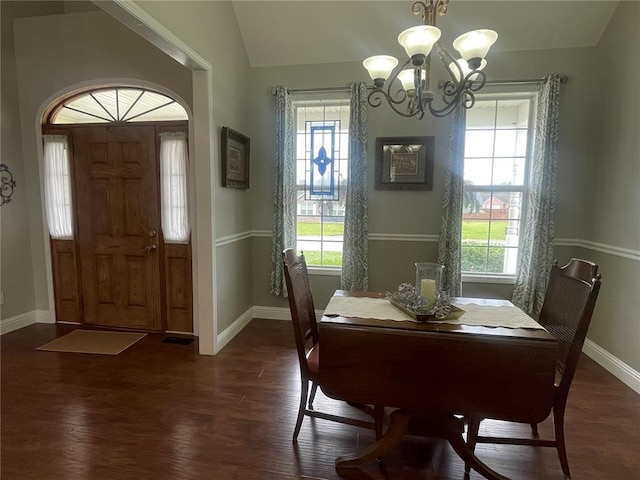 835 Bay Hill Blvd, Union, MO 63084 - dining room with a chandelier, plenty of natural light, baseboards, dark wood finished floors, and lofted ceiling
