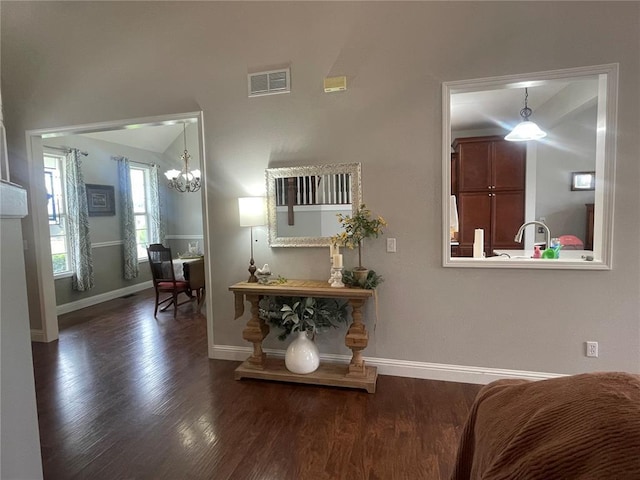 835 Bay Hill Blvd, Union, MO 63084 - foyer featuring wood finished floors, a chandelier, and baseboards