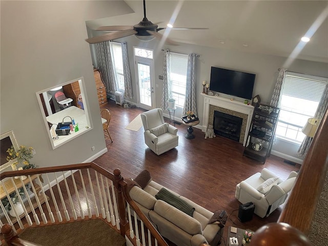 835 Bay Hill Blvd, Union, MO 63084 - living room featuring a ceiling fan, healthy amount of natural light, wood finished floors, and a fireplace