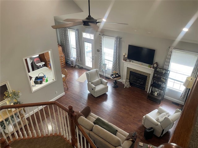 835 Bay Hill Blvd, Union, MO 63084 - living area with ceiling fan, plenty of natural light, wood finished floors, and a fireplace