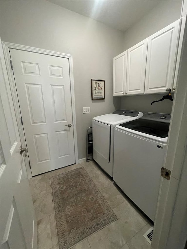 835 Bay Hill Blvd, Union, MO 63084 - washroom featuring separate washer and dryer and cabinet space