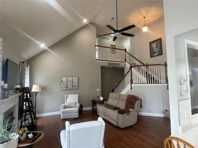 835 Bay Hill Blvd, Union, MO 63084 - living room with high vaulted ceiling, wood finished floors, a fireplace, stairs, and a ceiling fan
