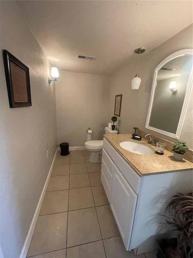 835 Bay Hill Blvd, Union, MO 63084 - half bath with tile patterned floors, toilet, vanity, and baseboards