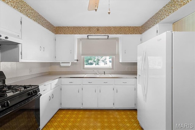 1816 N Belt, Belleville, IL 62221 - kitchen featuring white fridge with ice dispenser, black gas range, range hood, light flooring, and light countertops