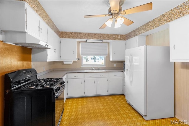1816 N Belt, Belleville, IL 62221 - kitchen with white fridge with ice dispenser, black gas stove, light flooring, ceiling fan, and under cabinet range hood