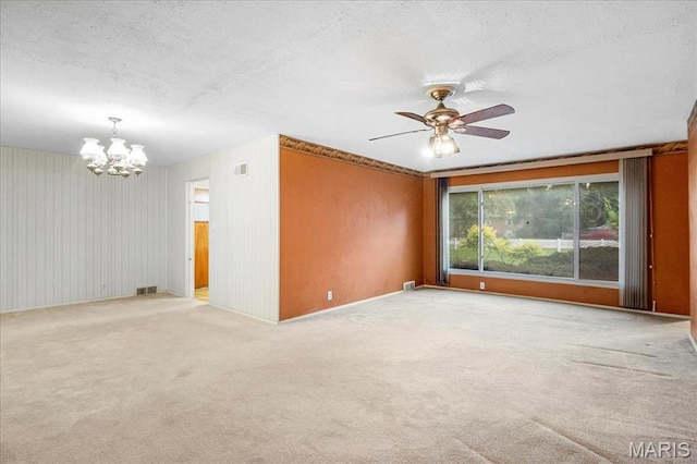 1816 N Belt, Belleville, IL 62221 - empty room with a chandelier, a textured ceiling, a ceiling fan, and light colored carpet