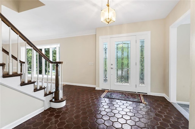 9216 Matthews Ln, Sunset Hills, MO 63127 - entryway featuring stairway, baseboards, stone finish floors, and crown molding