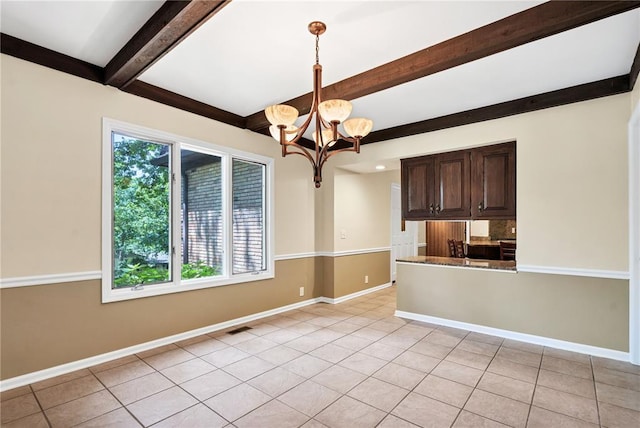 9216 Matthews Ln, Sunset Hills, MO 63127 - unfurnished dining area with a chandelier, light tile patterned flooring, beam ceiling, and baseboards