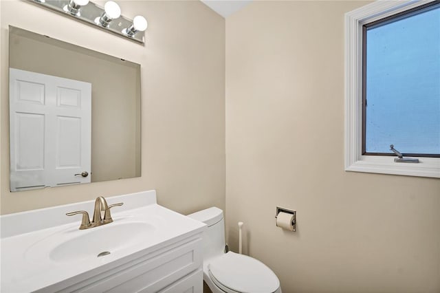 9216 Matthews Ln, Sunset Hills, MO 63127 - bathroom with healthy amount of natural light, toilet, and vanity