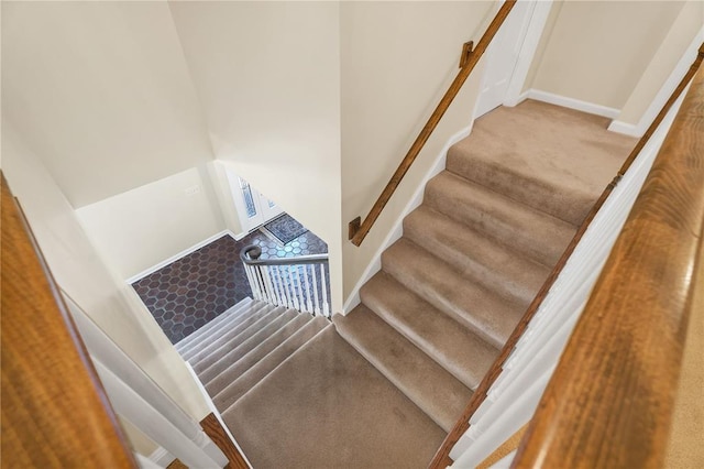 9216 Matthews Ln, Sunset Hills, MO 63127 - staircase featuring carpet flooring and baseboards
