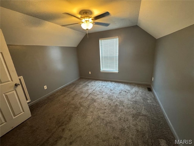 2828 Rutger St, Saint Louis, MO 63104 - additional living space featuring lofted ceiling, ceiling fan, carpet floors, and baseboards