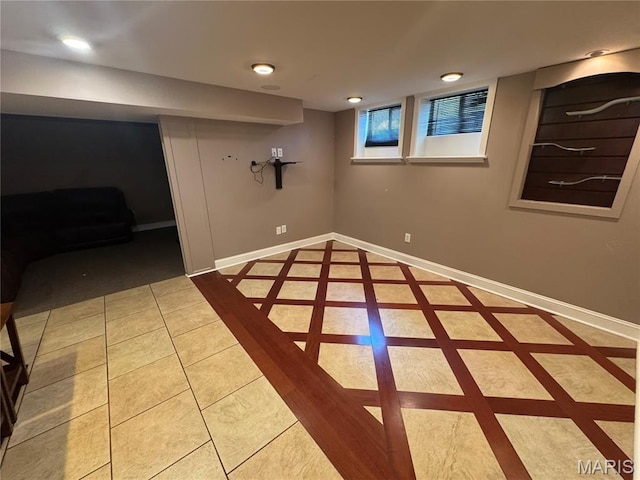 2828 Rutger St, Saint Louis, MO 63104 - basement featuring baseboards, tile patterned floors, inlaid floor details, and recessed lighting