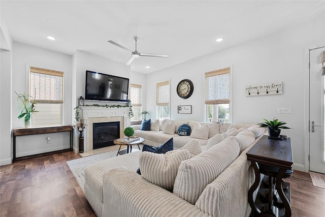 1017 Kilderkin Way, Saint Charles, MO 63301 - living room with ceiling fan, wood finished floors, a fireplace with flush hearth, baseboards, and recessed lighting