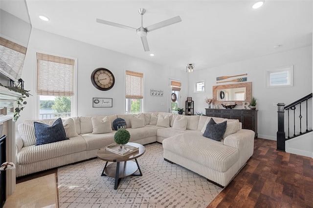 1017 Kilderkin Way, Saint Charles, MO 63301 - living area with wood finished floors, plenty of natural light, stairway, a ceiling fan, and recessed lighting