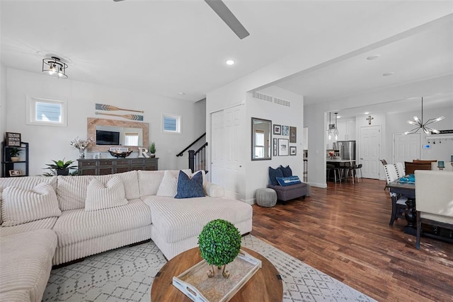 1017 Kilderkin Way, Saint Charles, MO 63301 - living room featuring stairway, ceiling fan, wood finished floors, recessed lighting, and baseboards