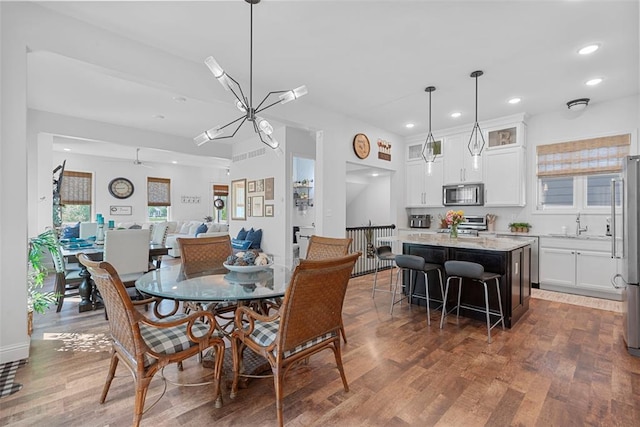 1017 Kilderkin Way, Saint Charles, MO 63301 - dining area featuring wood finished floors and recessed lighting
