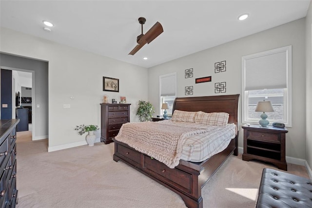 1017 Kilderkin Way, Saint Charles, MO 63301 - bedroom featuring light colored carpet, baseboards, a ceiling fan, recessed lighting, and multiple windows