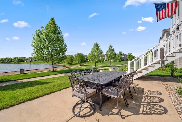 1017 Kilderkin Way, Saint Charles, MO 63301 - view of patio with outdoor dining space, a water view, and stairs