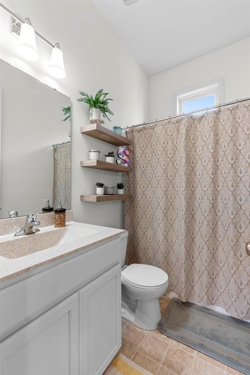 1017 Kilderkin Way, Saint Charles, MO 63301 - full bathroom with toilet, vanity, and a shower with curtain
