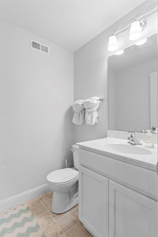 1017 Kilderkin Way, Saint Charles, MO 63301 - bathroom with vanity, toilet, and baseboards