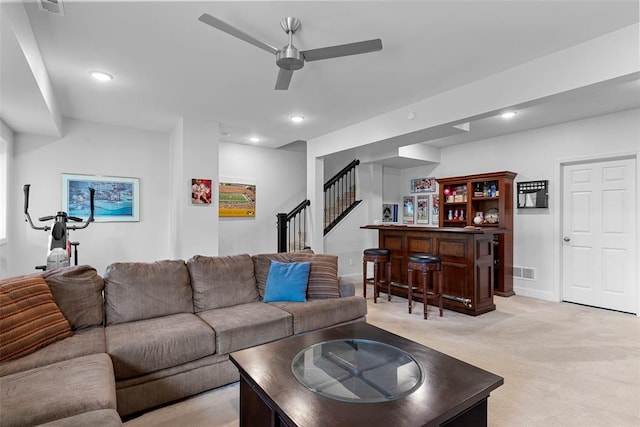 1017 Kilderkin Way, Saint Charles, MO 63301 - living room with a bar, ceiling fan, light colored carpet, stairway, and recessed lighting