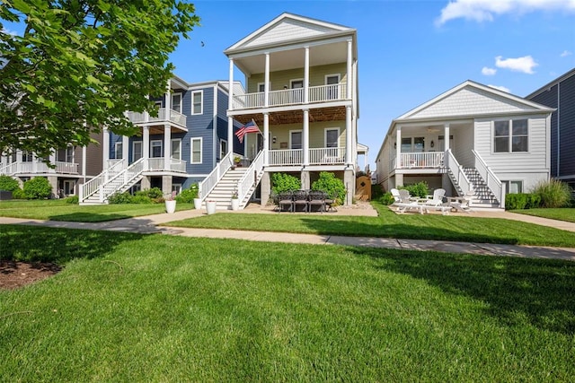 1017 Kilderkin Way, Saint Charles, MO 63301 - coastal inspired home with stairs and a front lawn