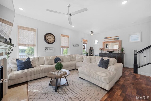 1017 Kilderkin Way, Saint Charles, MO 63301 - living area featuring plenty of natural light, wood finished floors, stairs, a ceiling fan, and recessed lighting