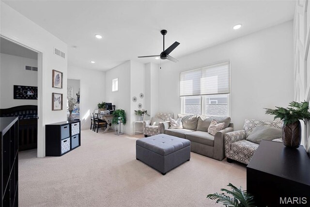1017 Kilderkin Way, Saint Charles, MO 63301 - living area featuring light carpet, a ceiling fan, and recessed lighting
