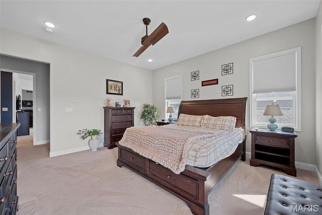 1017 Kilderkin Way, Saint Charles, MO 63301 - bedroom featuring light colored carpet, baseboards, ceiling fan, recessed lighting, and multiple windows