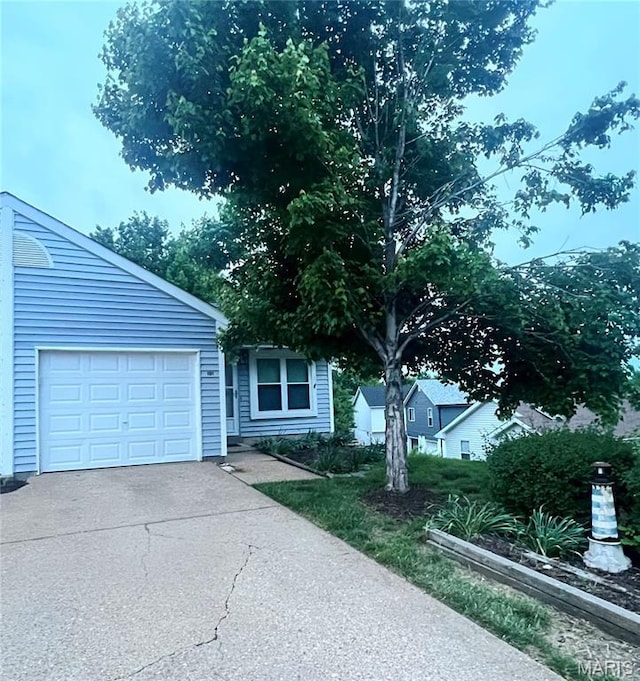 101 Carnegie Ct, Valley Park, MO 63088 - view of front of home featuring concrete driveway and an attached garage