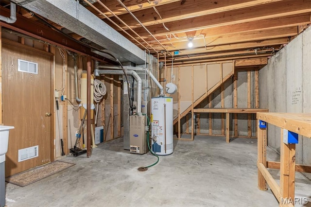 101 Carnegie Ct, Valley Park, MO 63088 - unfinished basement featuring water heater and heating unit