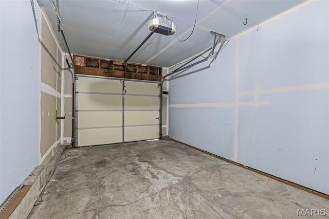 101 Carnegie Ct, Valley Park, MO 63088 - garage featuring a garage door opener