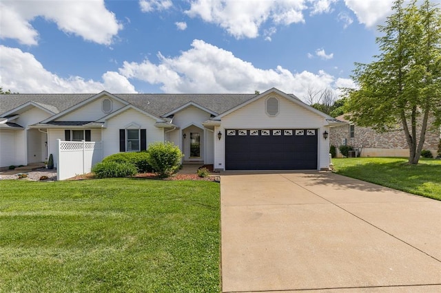 303 Holly Tree Ln, Farmington, MO 63640 - ranch-style house with a garage, driveway, and a front yard