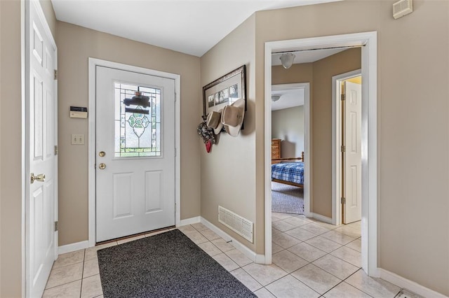 303 Holly Tree Ln, Farmington, MO 63640 - foyer entrance featuring baseboards and light tile patterned flooring