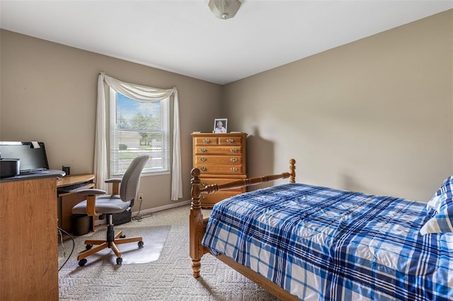 303 Holly Tree Ln, Farmington, MO 63640 - bedroom featuring light colored carpet, baseboards, and a desk