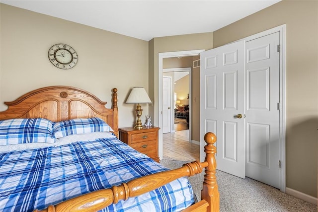 303 Holly Tree Ln, Farmington, MO 63640 - bedroom with baseboards and light carpet