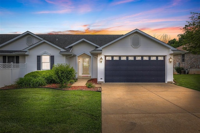 303 Holly Tree Ln, Farmington, MO 63640 - ranch-style home featuring driveway, a yard, an attached garage, and cooling unit