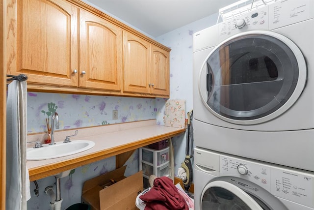 28 Spring Lake Rd, Perryville, MO 63775 - washroom with stacked washing machine and dryer and cabinet space