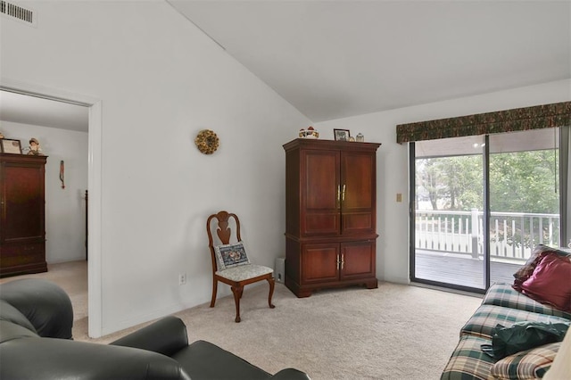1306 Glendale Gardens Dr Unit C, Glendale, MO 63122 - living room featuring light carpet and vaulted ceiling