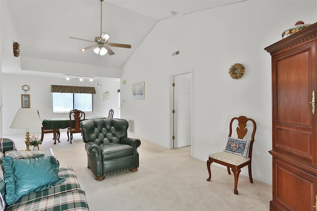 1306 Glendale Gardens Dr Unit C, Glendale, MO 63122 - living area featuring ceiling fan, vaulted ceiling, and light carpet