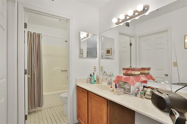 1306 Glendale Gardens Dr Unit C, Glendale, MO 63122 - full bath featuring vanity, tile patterned floors, shower / tub combo with curtain, and toilet