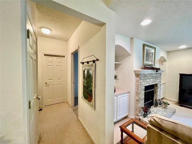 2087 Hawks Landing Dr Unit S, Lake St Louis, MO 63367 - hall with a textured ceiling, light carpet, and baseboards