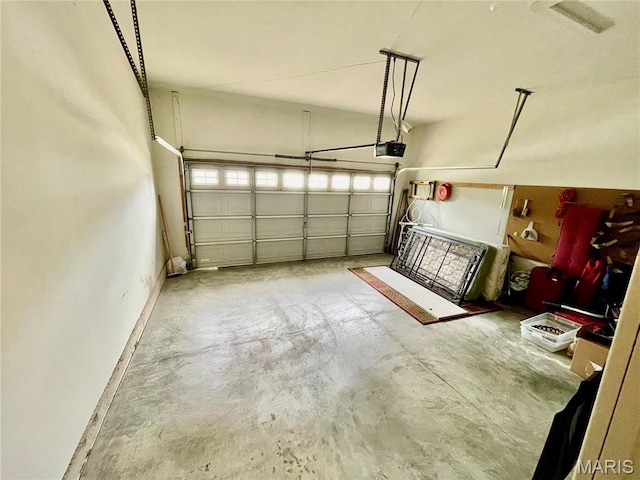 2087 Hawks Landing Dr, Lake St Louis, MO 63367 - garage featuring a garage door opener