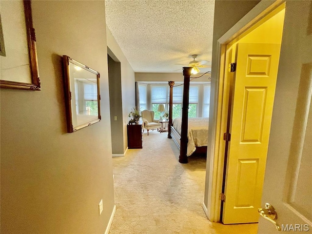 2087 Hawks Landing Dr, Lake St Louis, MO 63367 - hall with a textured ceiling and light carpet