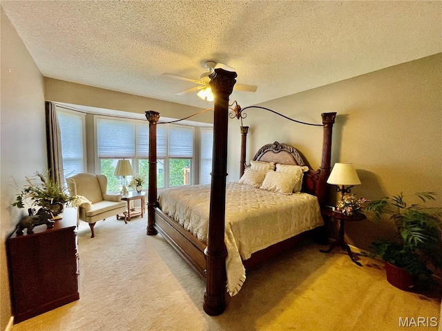 2087 Hawks Landing Dr, Lake St Louis, MO 63367 - bedroom featuring light colored carpet, a textured ceiling, and ceiling fan