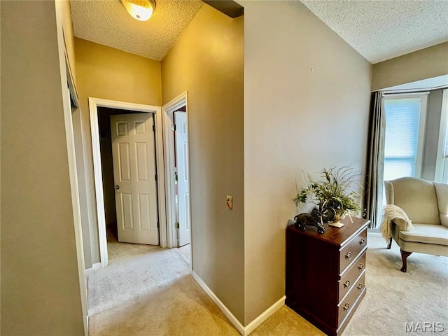 2087 Hawks Landing Dr, Lake St Louis, MO 63367 - hall with a textured ceiling and light carpet